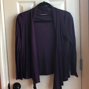 Asymmetrical knit drape